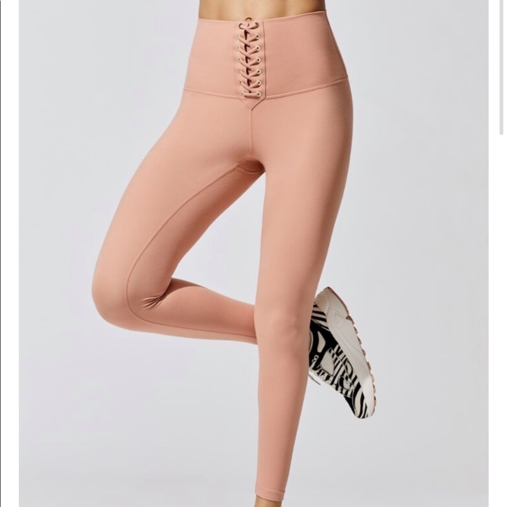 WeWoreWhat Lace Up Leggings in Peach in a size S